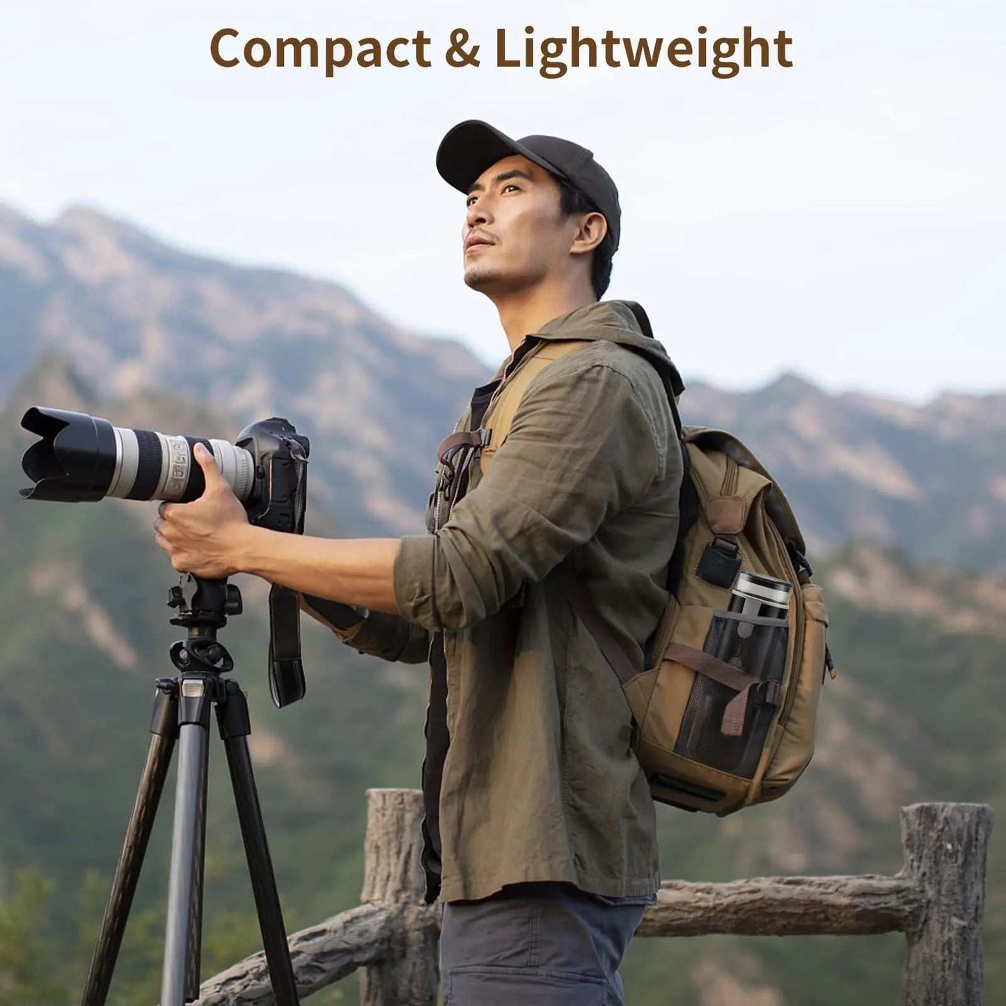 Man carrying backpack with portable coffee brewer in side pocket while setting up camera tripod outdoors in mountainous area