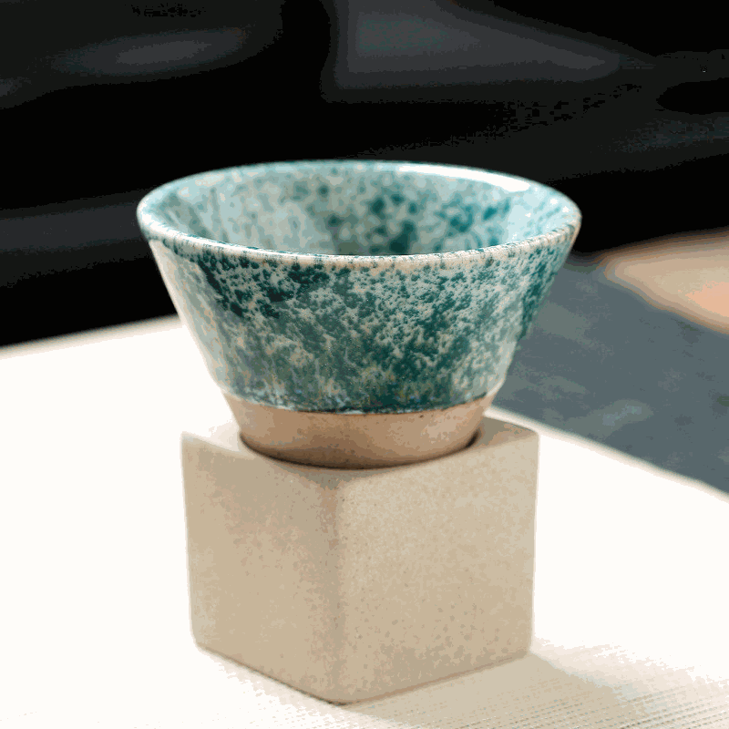Japanese retro ceramic coffee cup in teal with a matte base, perfect for enjoying your favorite beverage.