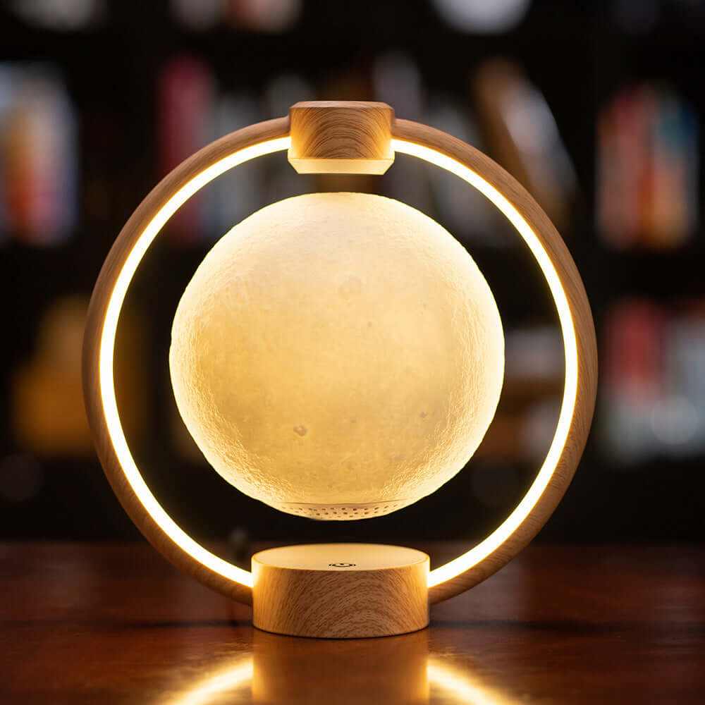 Floating Moonlight Bluetooth Speaker with colorful glowing levitating moon design and 360-degree sound.