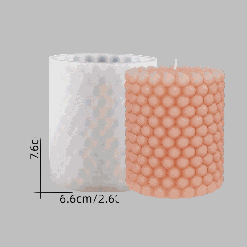 Two silicone bubble candle molds in round and cylindrical shapes, showcasing a unique bubble design for crafting.