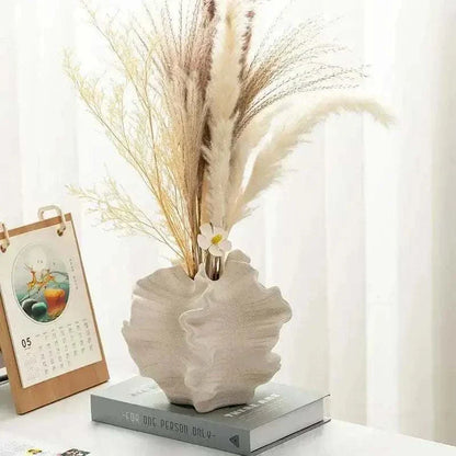 Petal Waves porcelain vase with dried flowers, elegant home decor accent for flower arrangements.