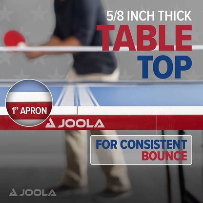 Close-up of JOOLA foldable indoor ping pong table showing 5/8 inch thick tabletop and 1 inch apron for consistent bounce with red, white, and blue patriotic design