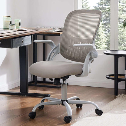 Ergonomic drafting chair with adjustable footrest, lumbar support, and swivel base