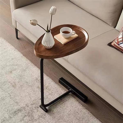 C shaped side table water drop steel base close-up detail