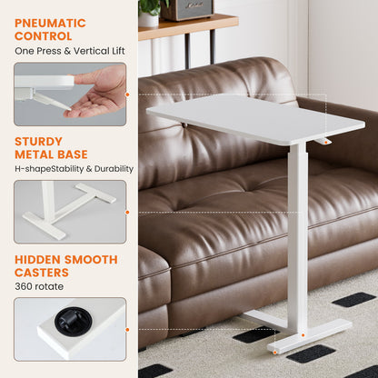 mobile laptop desk with adjustable height white finish next to sofa