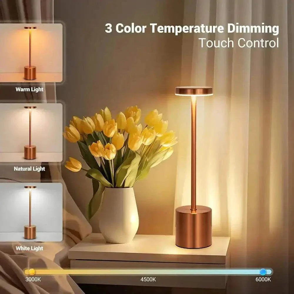 TouchGlow LED lamp with touch control showcasing three color temperatures next to a vase of yellow flowers.