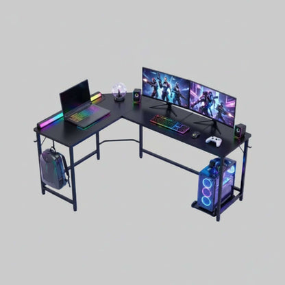 L Shaped Gaming Desk with dual monitors, gaming laptop, and colorful RGB lighting setup.