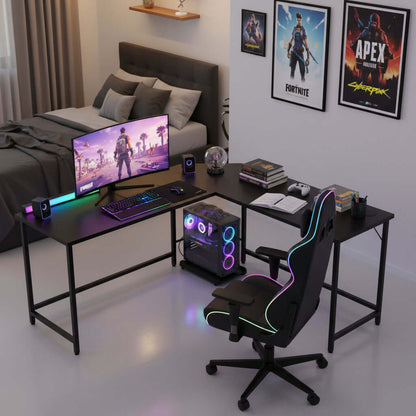 L Shaped Gaming Desk featuring a modern setup with gaming chair, dual monitors, and decorative posters in a bedroom.