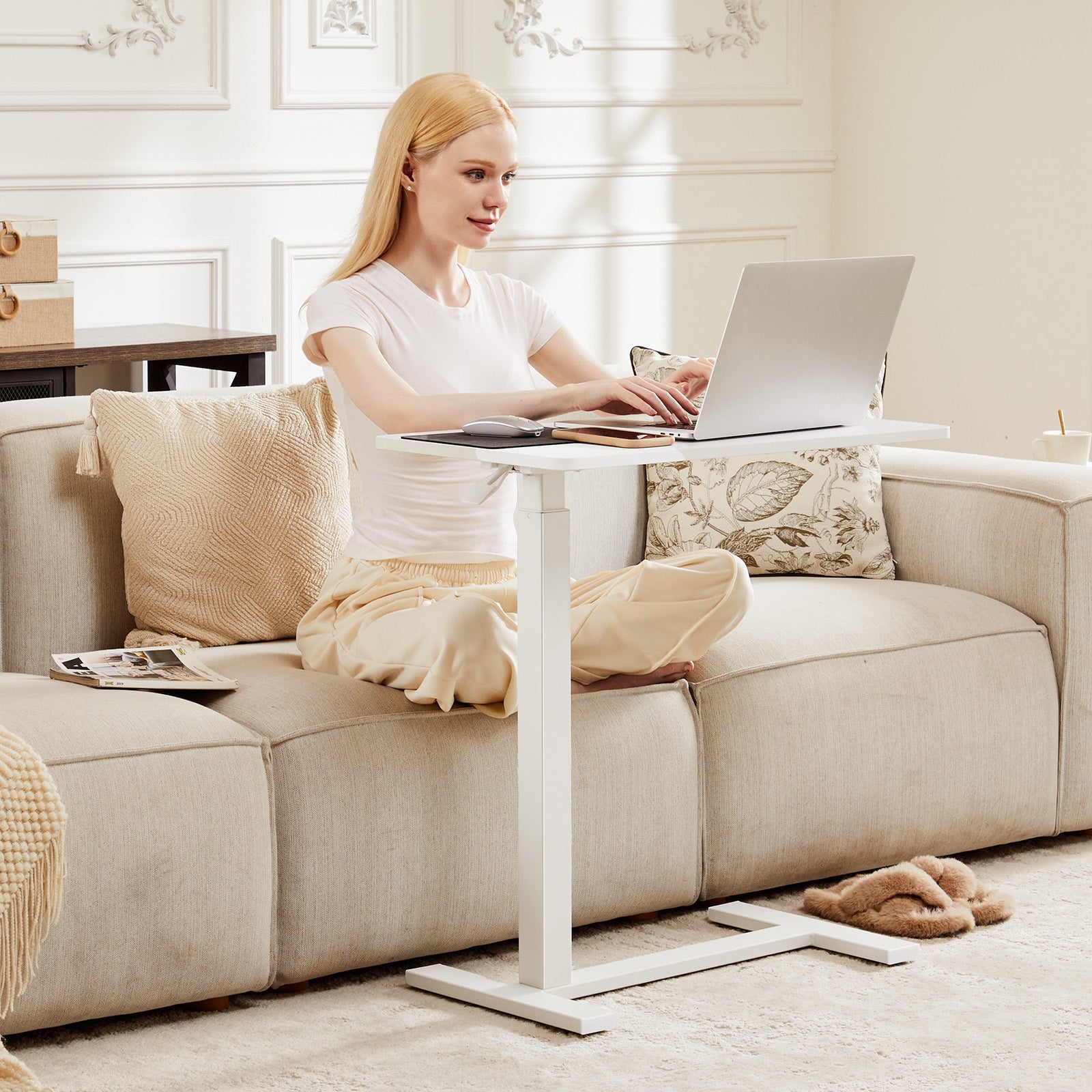 mobile laptop desk with adjustable height brown color in bedroom setting