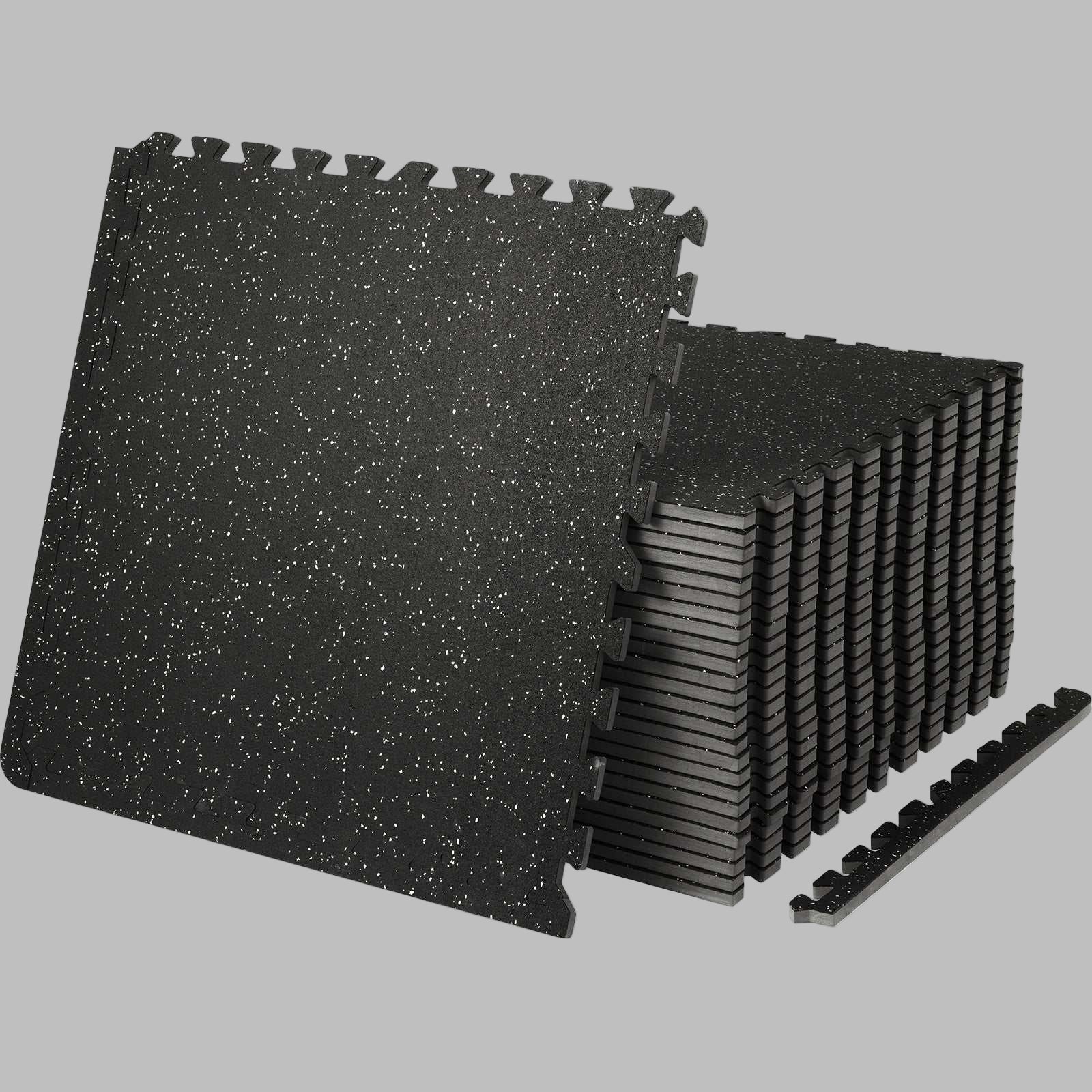 Set of black interlocking gym floor mats with white speckles, 25 pieces, 1/2 inch thick, made of EVA foam and rubber, designed for home workout spaces.