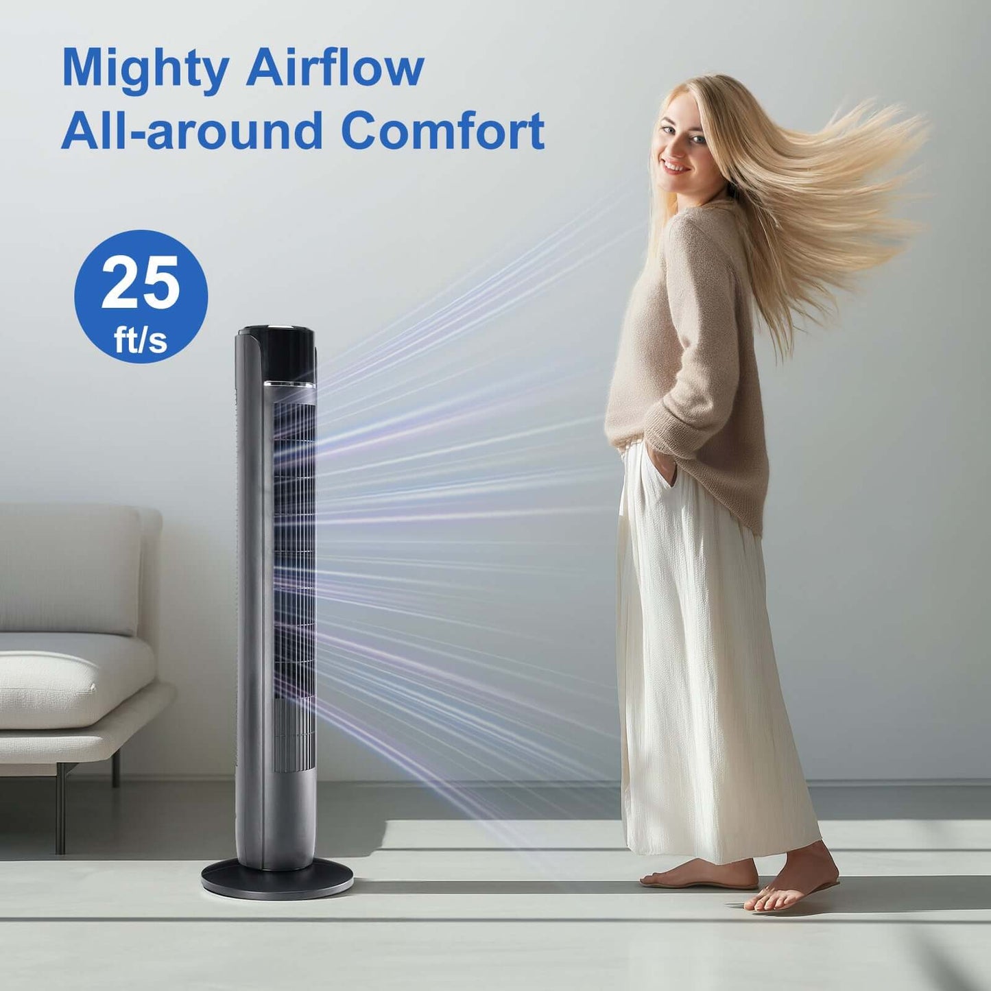 standing fan living room lifestyle grey tower fan next to sofa