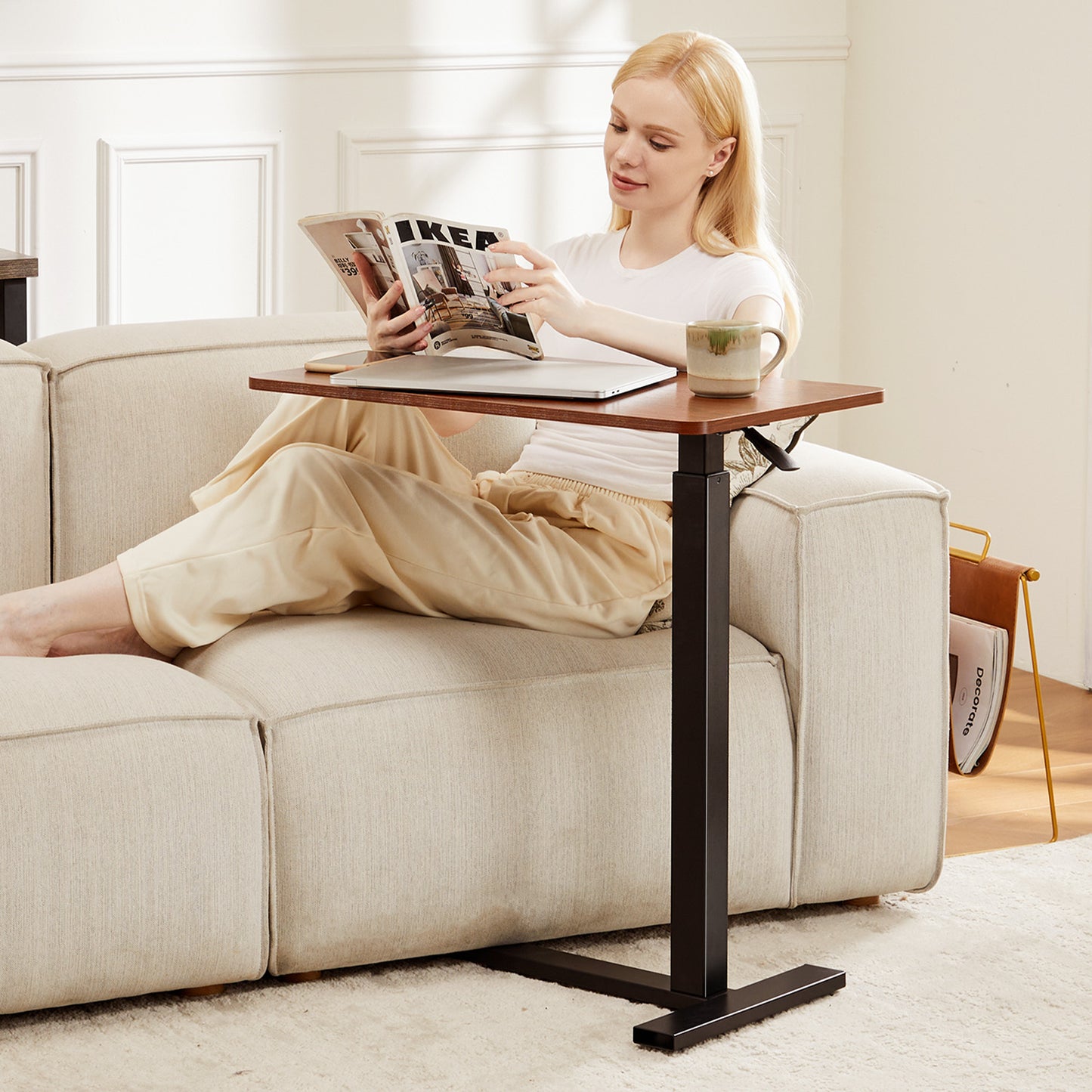 mobile laptop desk with adjustable height showing height range and caster wheels