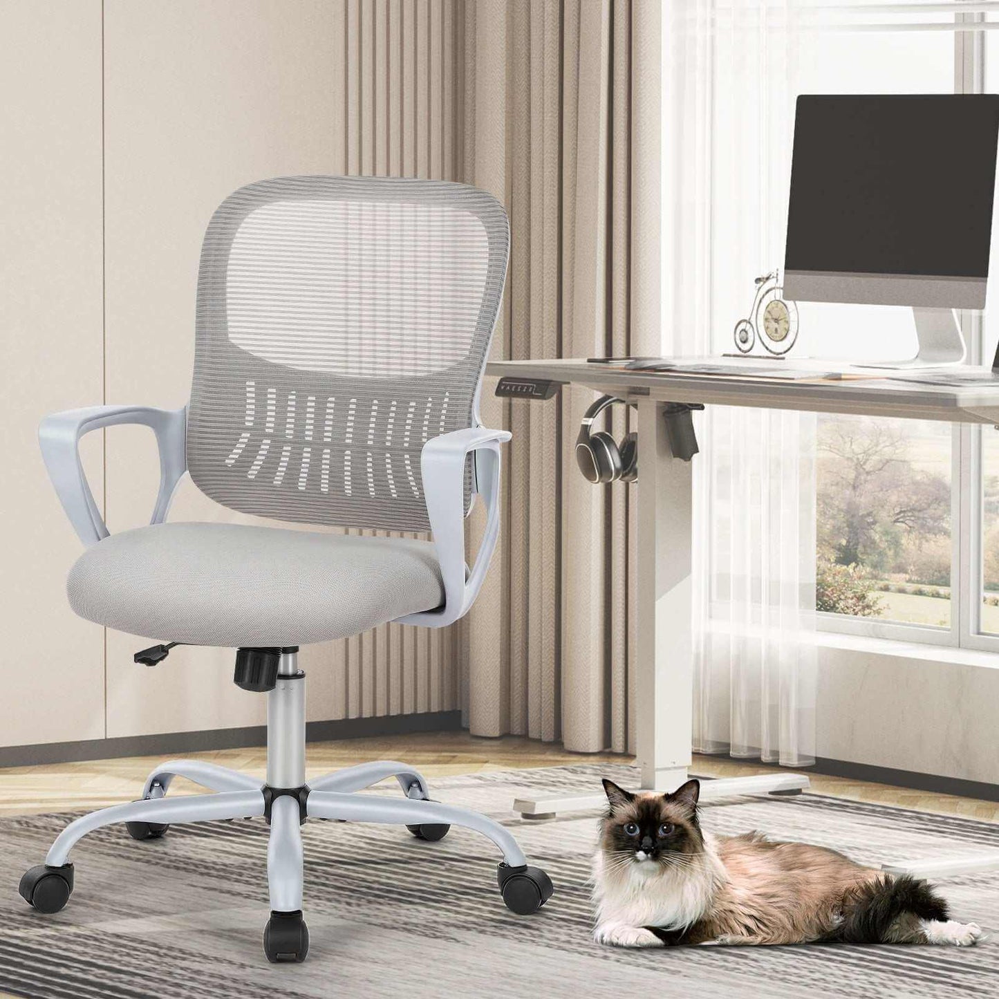 ergonomic drafting chair with adjustable footrest and lumbar support in black and gray colors