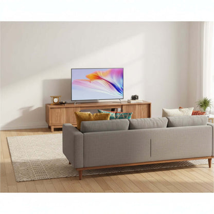 Mid Century Modern TV Stand with Storage displayed in a stylish living room featuring a cozy sofa and modern decor.