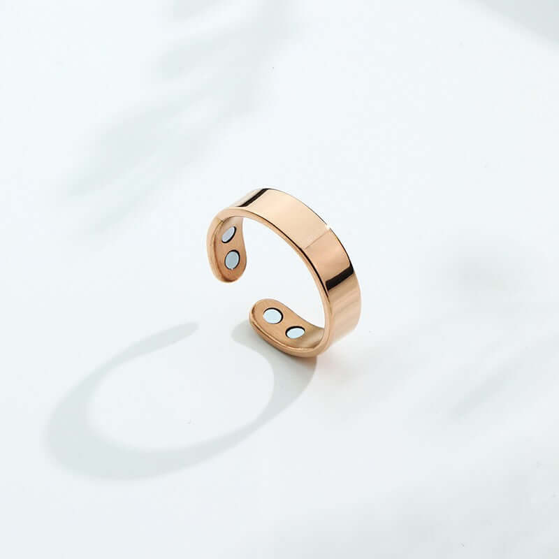 Magnetic Ring for Calm Nights displayed on a light background, showcasing its polished stainless steel design.