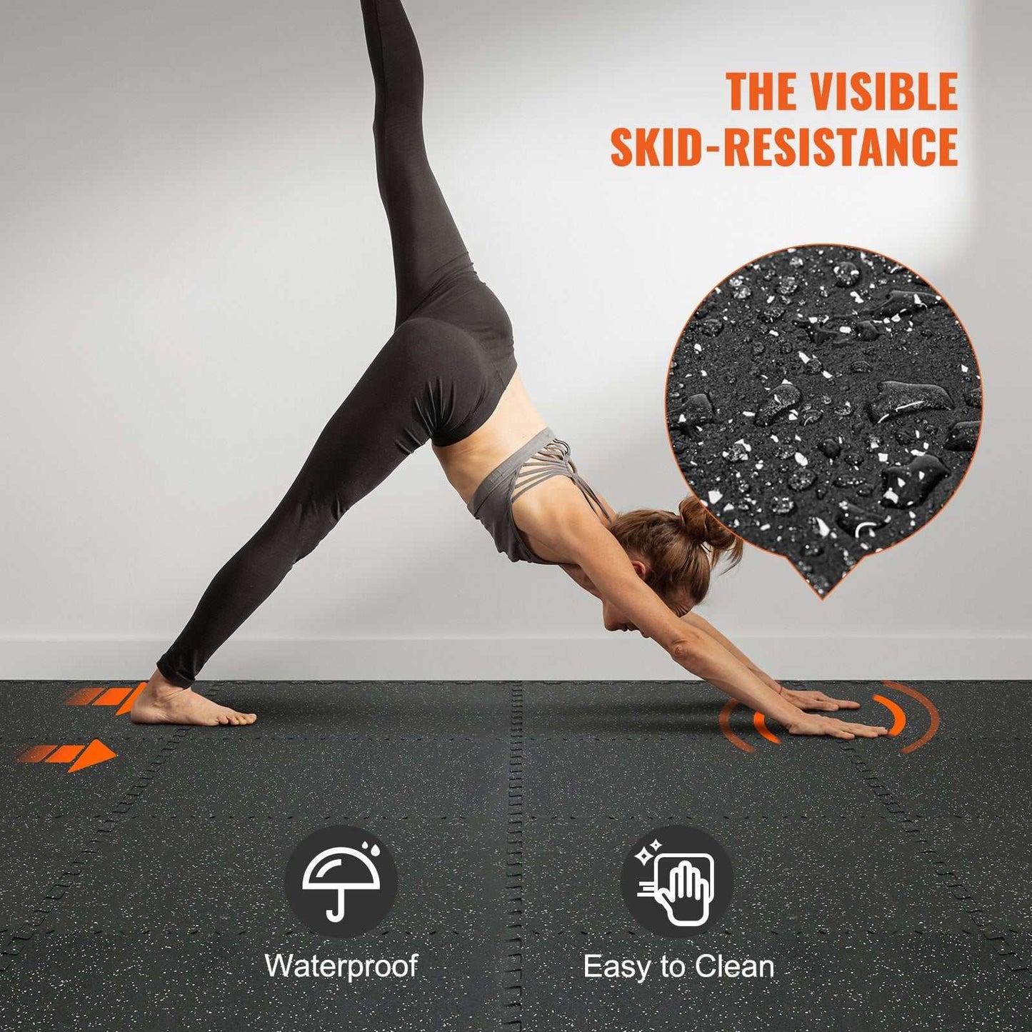 Woman doing yoga on waterproof, skid-resistant black gym floor mats easy to clean for home workouts