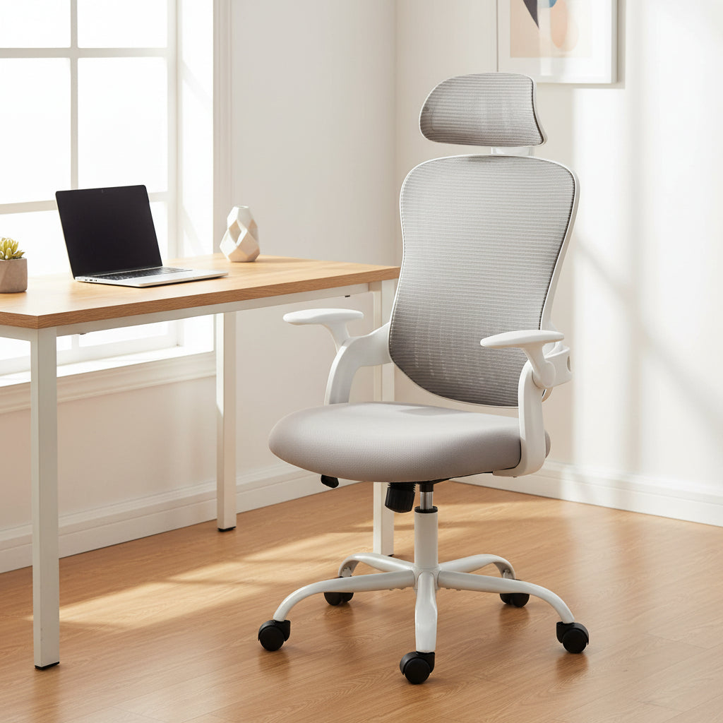 Ergonomic office chair with tall mesh back, adjustable headrest, flip-up arms, and smooth casters for all-day comfort