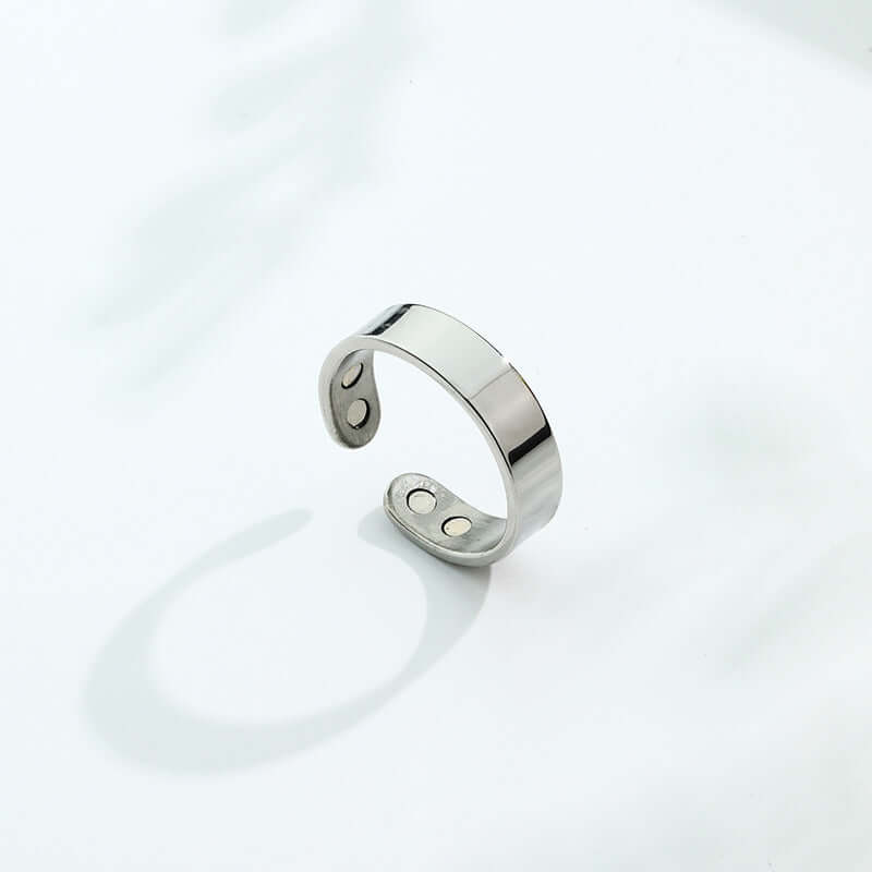Magnetic Ring for Calm Nights displayed on a light background, showcasing its minimalist design and polished finish.