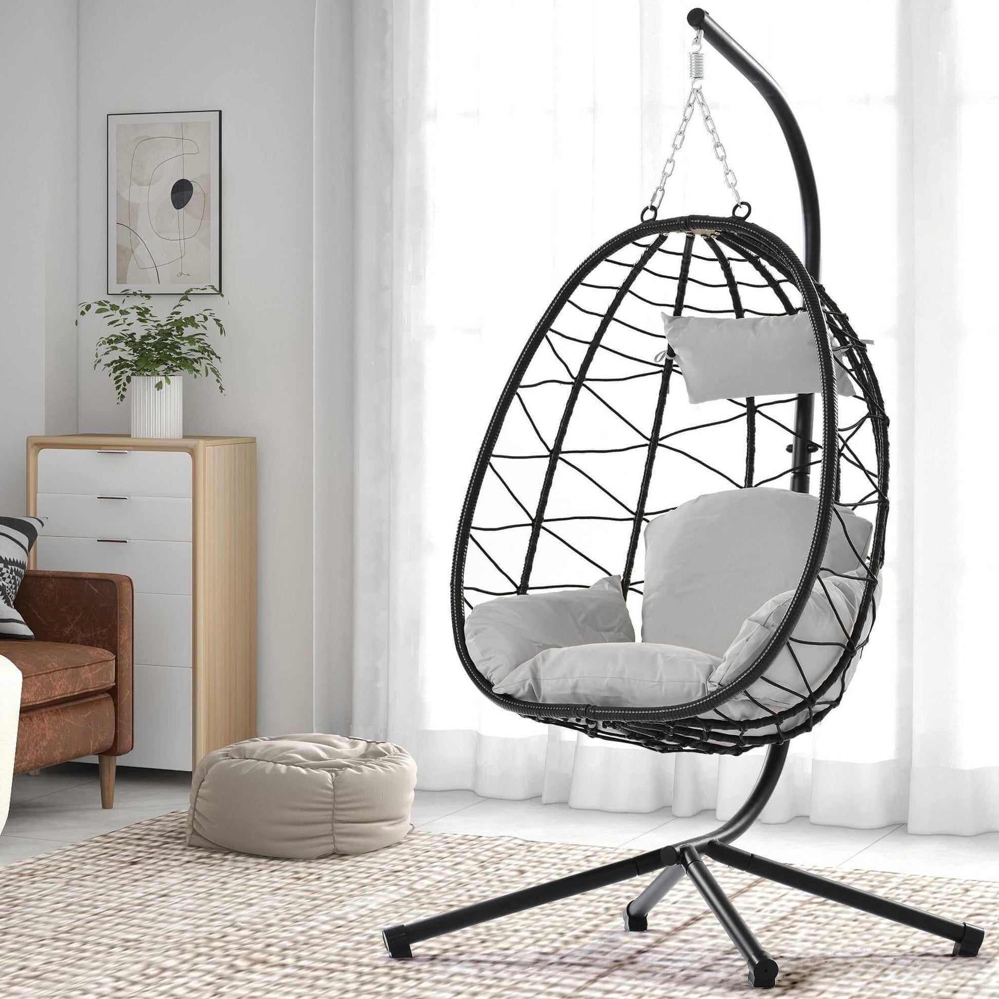 Cozy Hanging Egg Chair with black metal frame, grey cushions, indoor modern swing seat