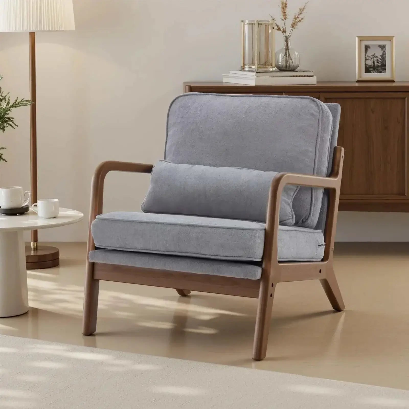 Mid century wooden lounge chair with gray cushions and rubberwood frame in modern living room setting