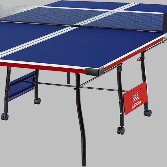 Foldable indoor ping pong table with blue playing surface, patriotic red, white, and blue design, and safety latch system for easy storage and solo practice.