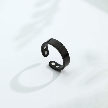 Magnetic Ring for Calm Nights displayed on a white surface, showcasing its minimalist design and subtle magnetic elements.