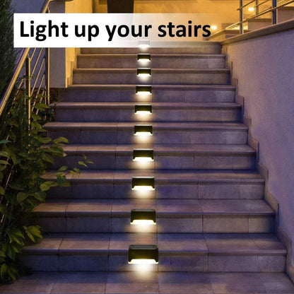 Solar deck light set illuminating outdoor stairs with warm white LED lights