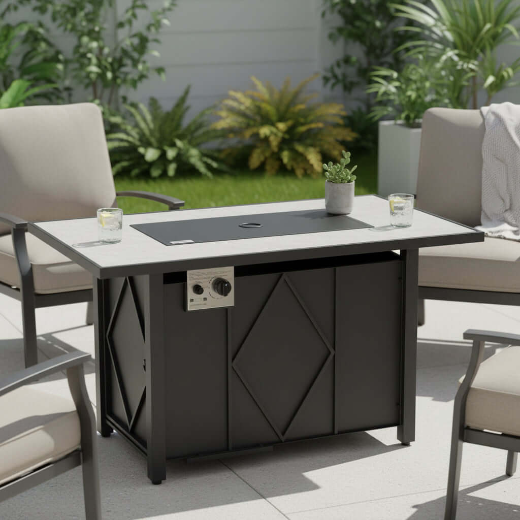 Propane Fire Pit Table in a patio setting with comfortable chairs and green plants, showcasing outdoor gathering space.