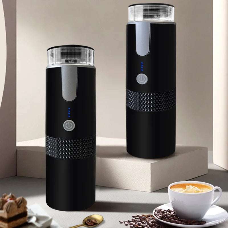 Compact black portable coffee brewer with LED power button and textured grip, designed for travel and outdoor use.