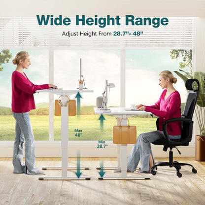 Woman adjusting an Ergonomic Height Adjustable Table showing a wide height range from 28.7" to 48".