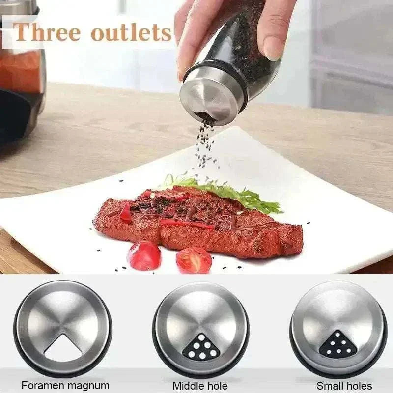 Person using a spice shaker with three outlet options to season a steak on a plate.